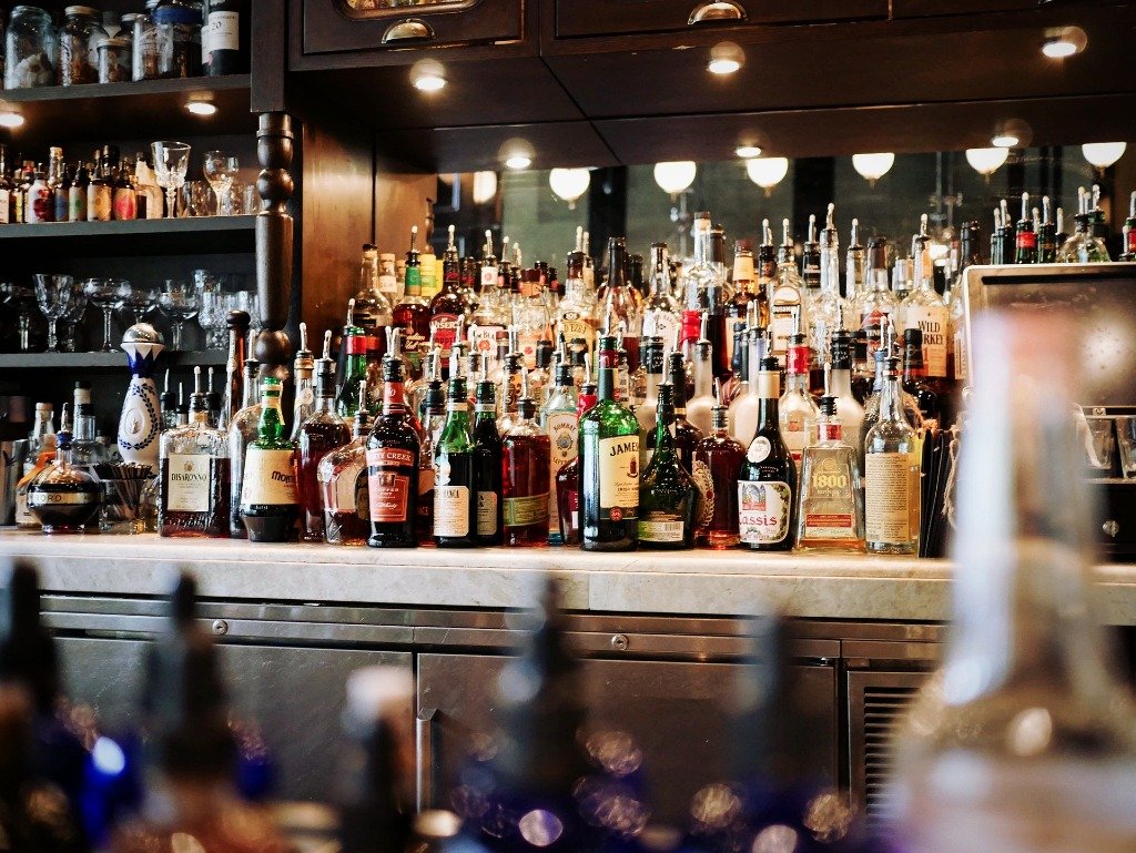 Shelves fully stocked with premium liquors at Madhuloka Bannerghatta Road
